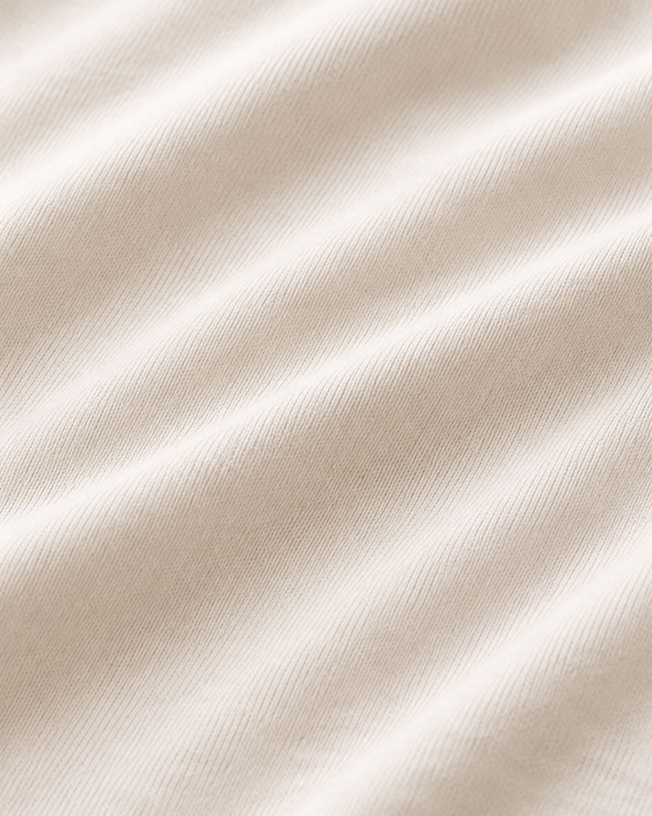Close-up of beige fabric with soft folds